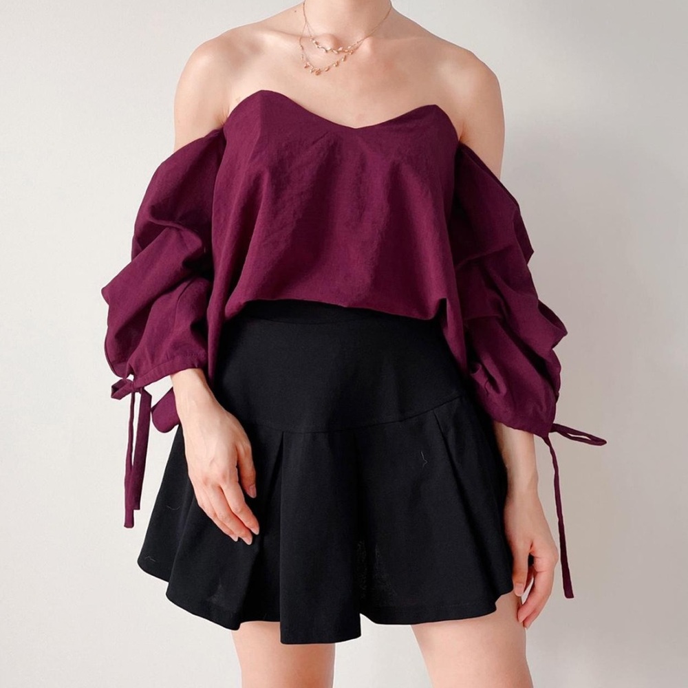 Plains and prints off the shoulder top